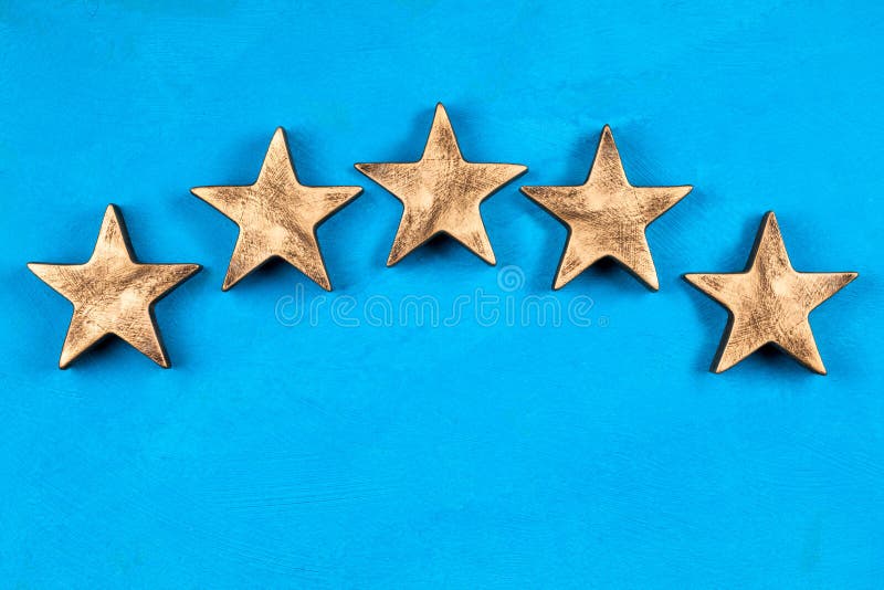 Five stars sign on blue background. Five stars sign on blue background