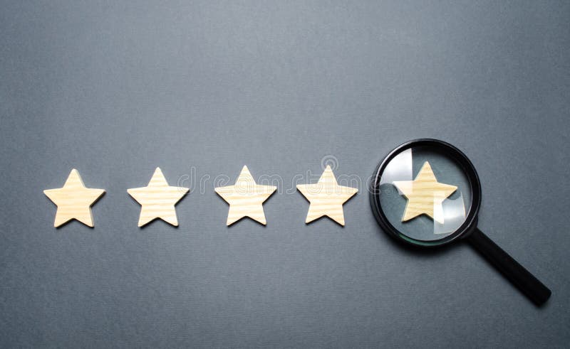 Five stars and a magnifying glass on the last star. Check the credibility of the rating or status of the institution, hotel, restaurant. Auditing, testing and certification. Getting the fifth star