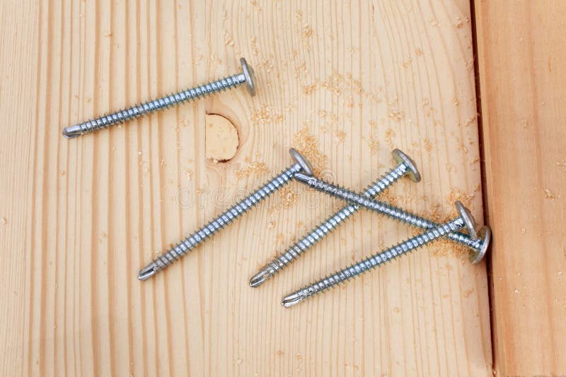Six Steel Screws on Wood Plank Stock Photo Image of smooth, hardwood