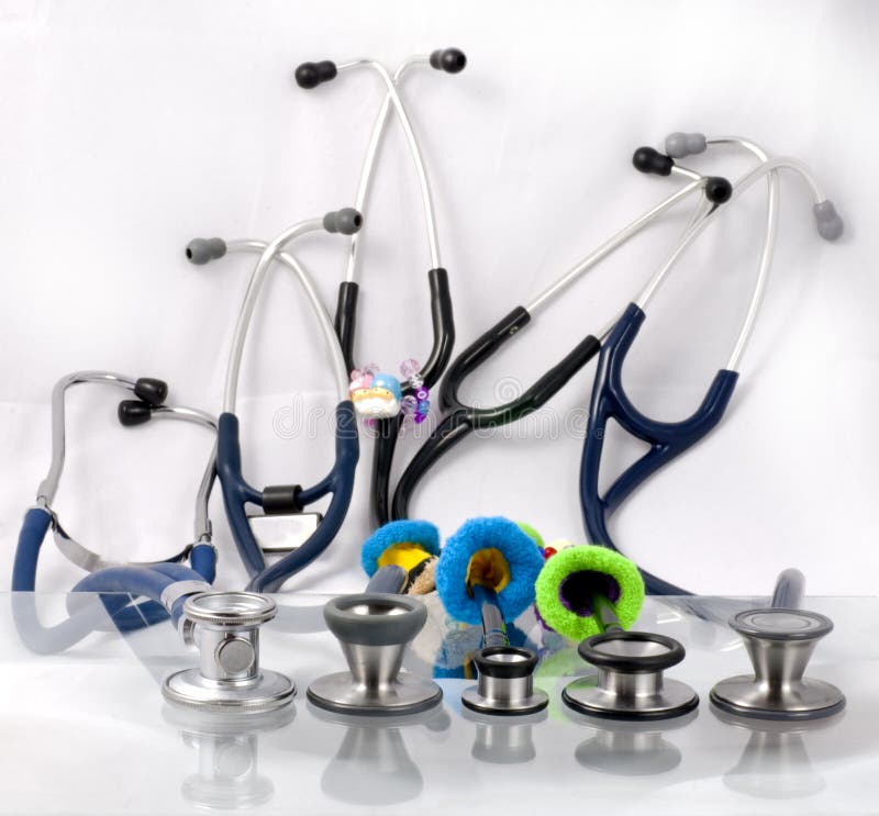 Five Stethoscope in a row stock photo. Image of metal 23586132