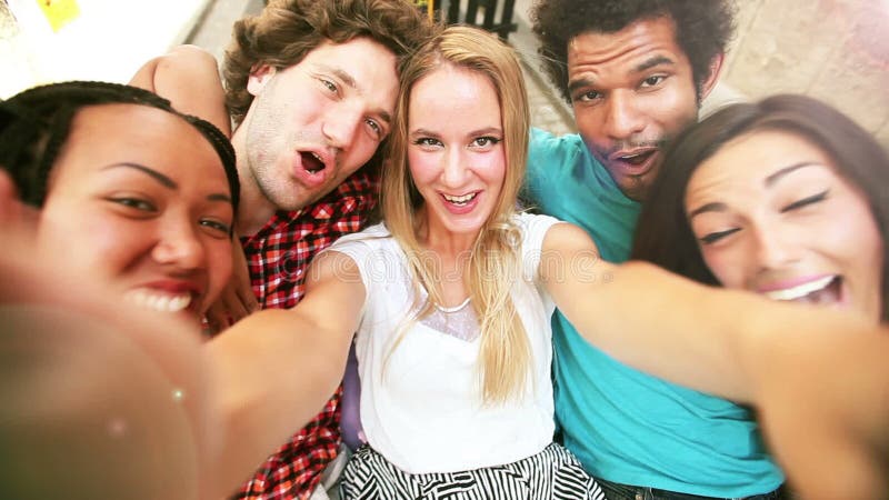 Three Young Adults Having Fun Cycling And Taking Selfies Stock Footage 