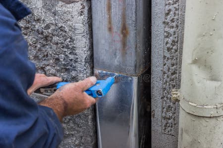 Fixing a Leaky Gutter Downspout 2 Stock Photo - Image of insurance