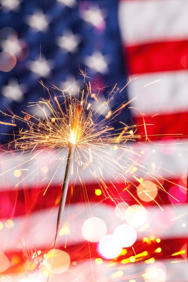 Fourth of july sparkler pyrotechnics july patriotism flag american culture. Fourth of july sparkler pyrotechnics july patriotism flag american culture