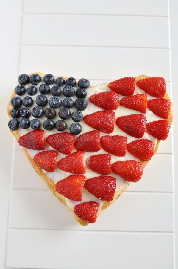 Heart Shaped Fourth of July Independance Cake with fresh berries. Heart Shaped Fourth of July Independance Cake with fresh berries