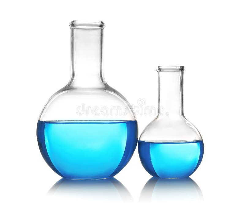 Flacons avec le liquide bleu sur la table sur le fond blanc photos libres de droits Flacons avec le liquide bleu sur la table sur le fond blanc photos libres de droits