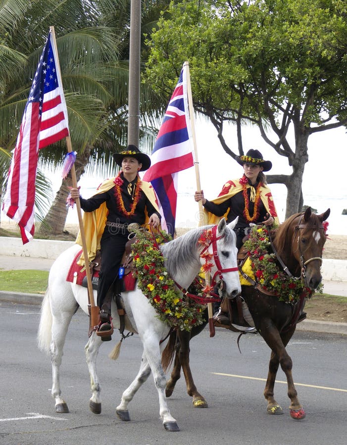 Event: Aloha Festival 13.IX.08 Location: Waikiki, Hawai'i Subject: American and Hawaiian flagbearers with horses adorned with flower leis and hibiscus lead off the Aloha Festivals parade to Kapi'olani Park. Event: Aloha Festival 13.IX.08 Location: Waikiki, Hawai'i Subject: American and Hawaiian flagbearers with horses adorned with flower leis and hibiscus lead off the Aloha Festivals parade to Kapi'olani Park.