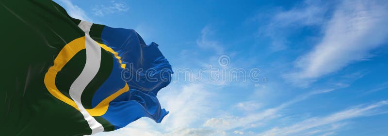 flag of Calne town at cloudy sky background on sunset. panoramic view. united kingdom of great Britain, England. copy space for wide banner. 3d illustration. flag of Calne town at cloudy sky background on sunset. panoramic view. united kingdom of great Britain, England. copy space for wide banner. 3d illustration