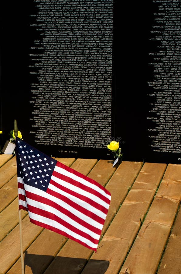 Flag and Flowers Honoring Our Fallen Soldiers Editorial Image Image