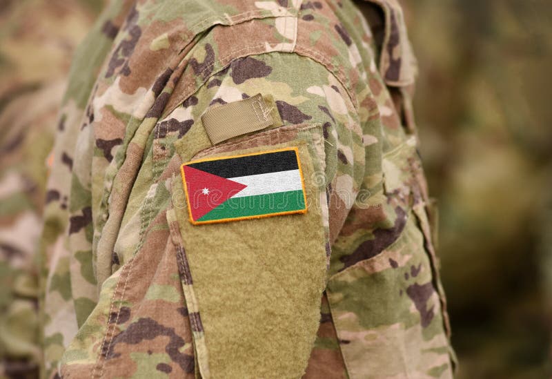 Flag of Jordan on Military Uniform. Army, Armed Forces, Soldiers Stock