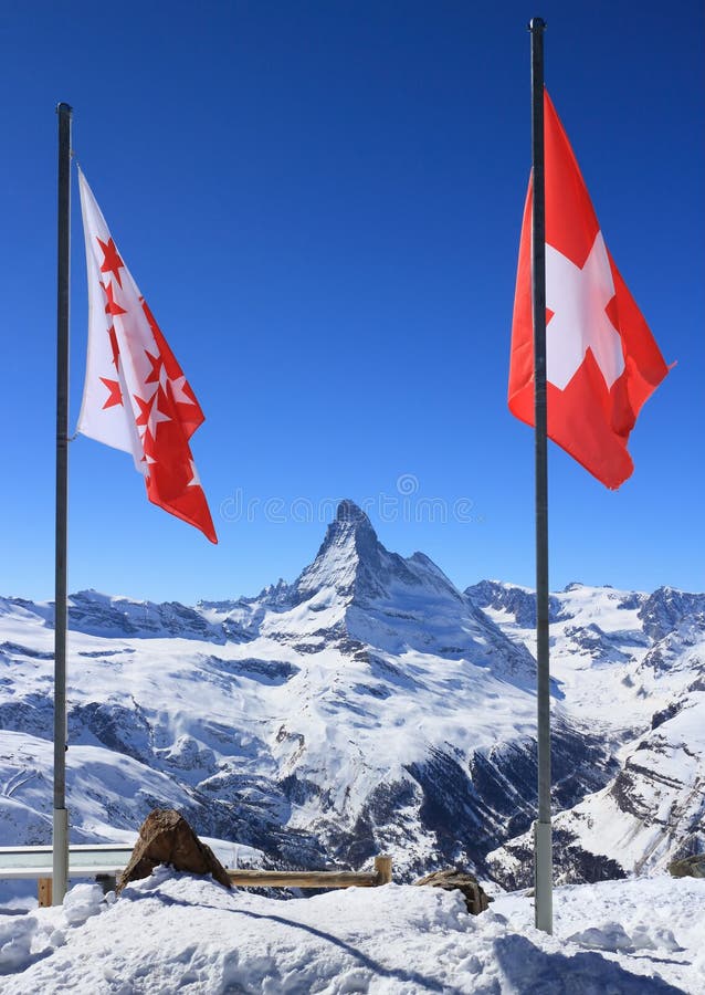 Flag of Switzerland on mountaintop royalty free stock photos Flag of Switzerland on mountaintop royalty free stock photos