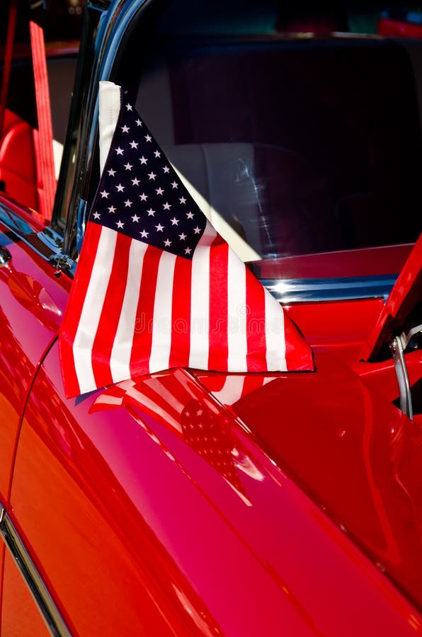 Patriotic American flag on a classic car. Patriotic American flag on a classic car