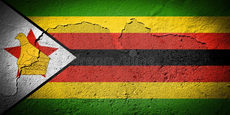 Flaga zimbabwe na pękniętej ścianie obraz royalty free