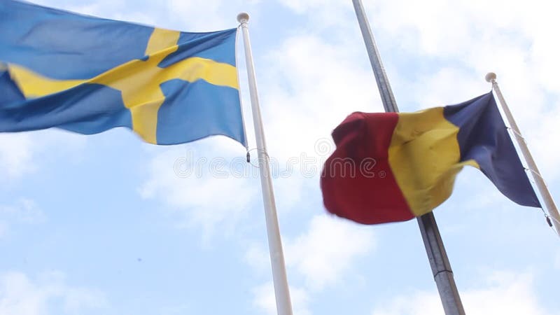 Flaggor av Rumänien och Sverige