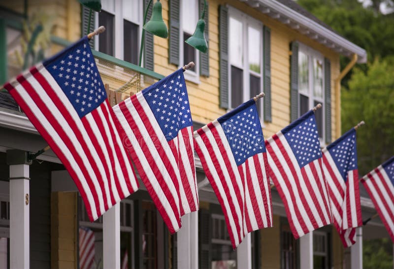 Country store draped with American flags on the fourth of july. Country store draped with American flags on the fourth of july