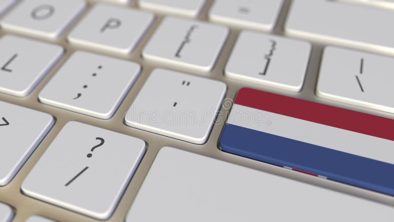 Key with flag of the Netherlands on the computer keyboard switches to key with flag of Great Britain, translation or