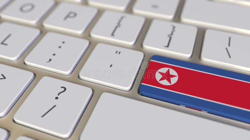 Key with flag of North Korea on the computer keyboard switches to key with flag of Great Britain, translation or