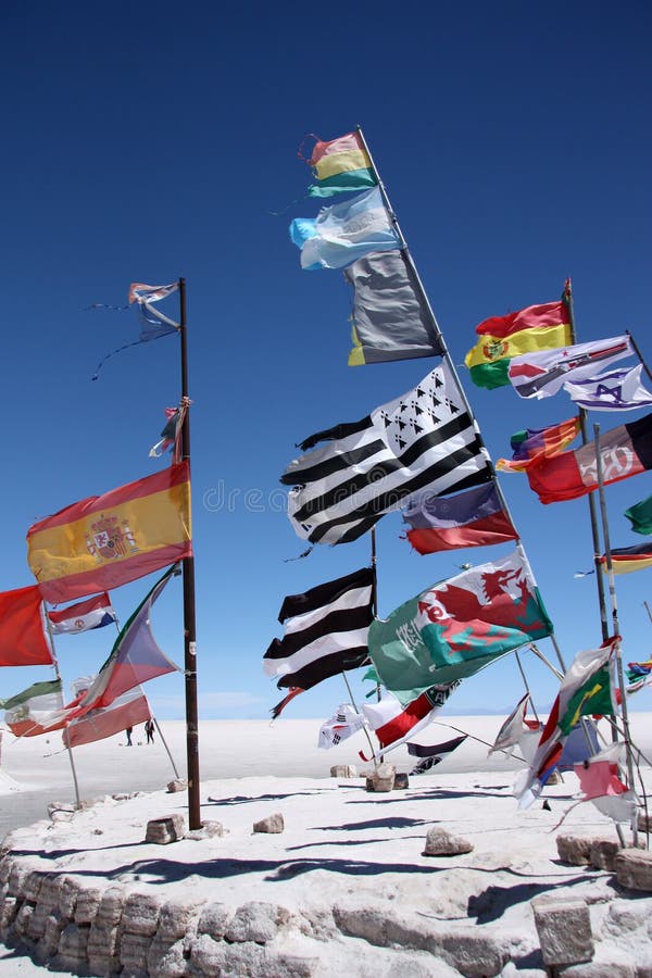 Flags in desert of Salar de Uyuni