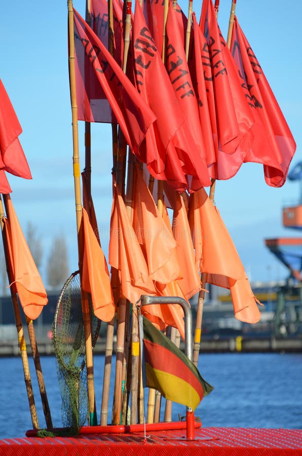The Flags of the Fishing Boat in Front of the Sunlight Stock Image