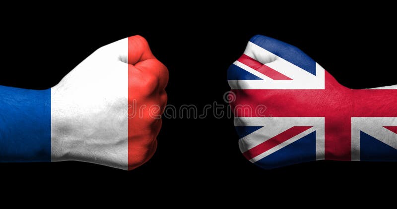 Flags of France and United Kingdom painted on two clenched fists facing each other on black background/France-UK relations concept stock photography Flags of France and United Kingdom painted on two clenched fists facing each other on black background/France-UK relations concept stock photography