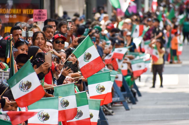 Flags and a Happy Crowd Enjoying the Mexican Independence Day Parade