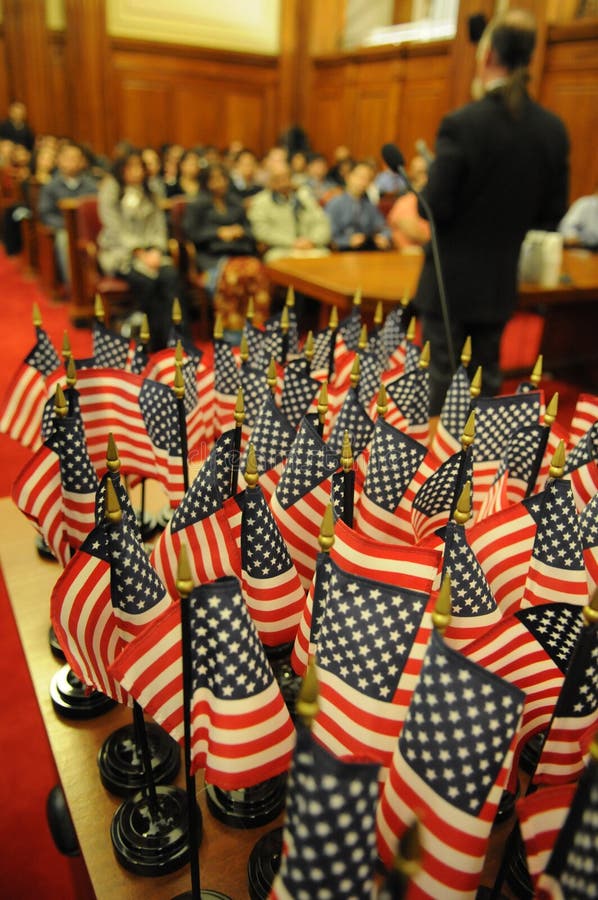 Flags during naturalization ceremony royalty free stock images