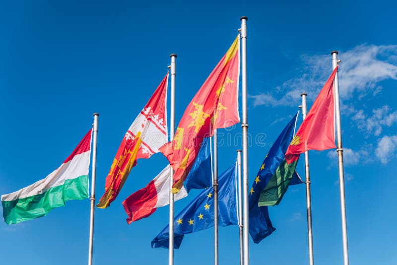 Flags on Place Rapp square, Colmar. Colmar is the third-largest commune of the Alsace region in north-eastern France, renowned for. Its well preserved old town royalty free stock photo Flags on Place Rapp square, Colmar. Colmar is the third-largest commune of the Alsace region in north-eastern France, renowned for. Its well preserved old town royalty free stock photo