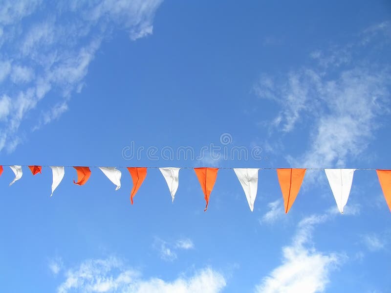 Flags in the sky stock image
