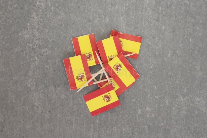 Flags of Spain on Grey Background royalty free stock photos