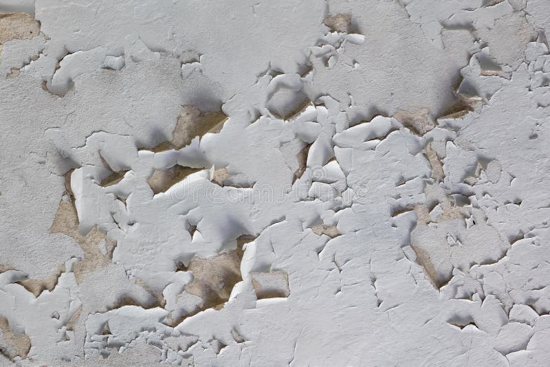 Flaky White Paint Peeling Off A Ceiling Background Stock Photo
