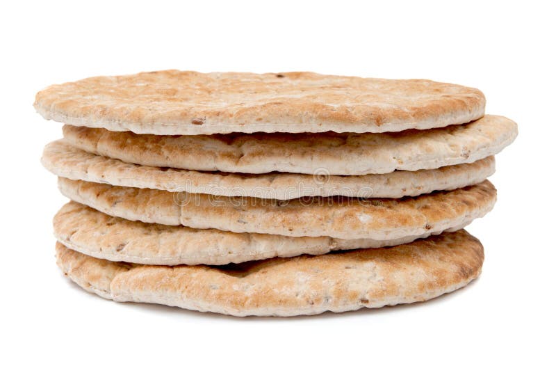 Flame baked pitas on white background stock photo