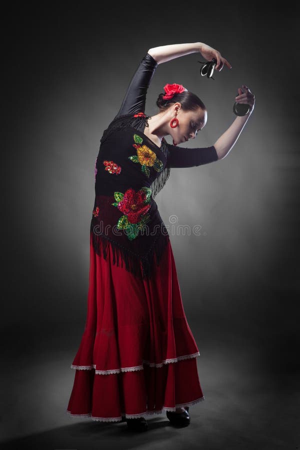 Flamenco di dancing della donna con i naccheri fotografia stock Flamenco di dancing della donna con i naccheri fotografia stock