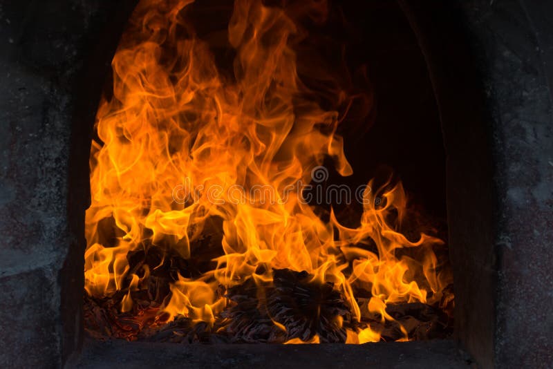 The flames are burning in the furnace. Blazing flames flare in the furnace stock photography The flames are burning in the furnace. Blazing flames flare in the furnace stock photography