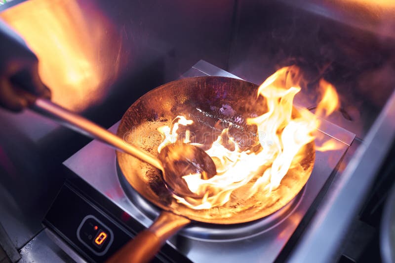 Traditional Chinese Food Wok Cooking On Open Fire. Stock Image