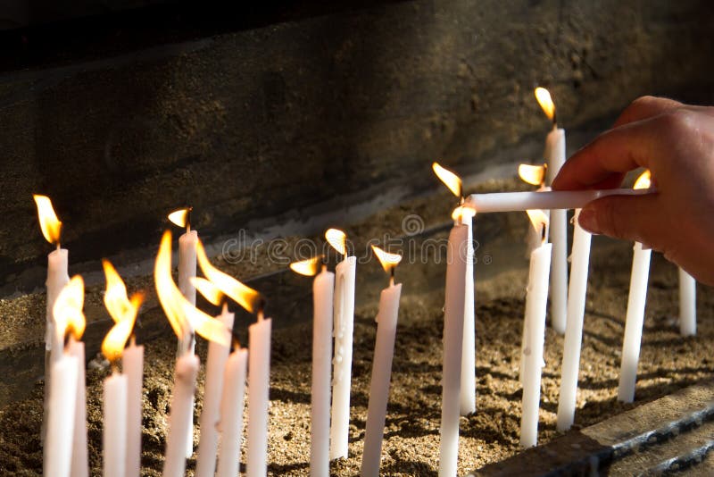 Flaming Candles for Prayer stock photo. Image of christian 48126436