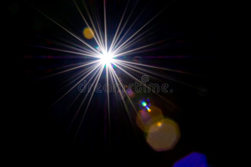 Flare color glow. Sun flash ray lens effect on black. Star spot light or sunlight glow. Abstract bokeh lights and. Optical leaking reflection