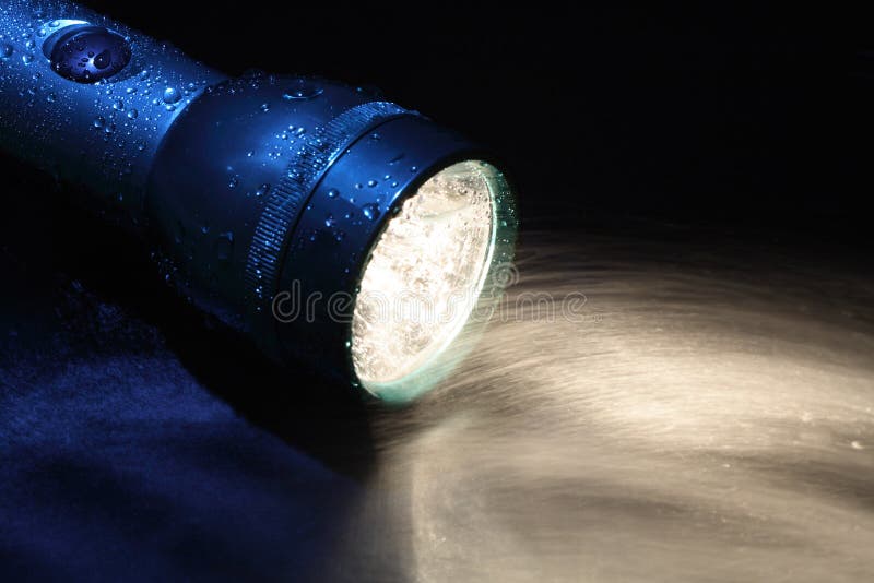 Flashlight And Water