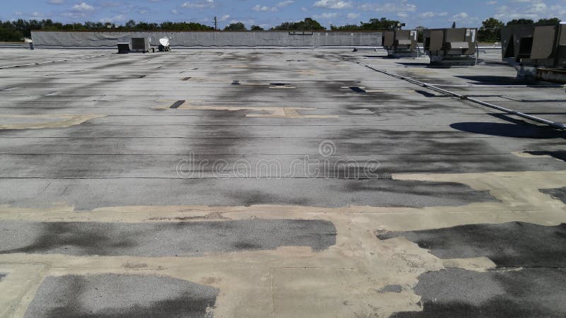 Flat commercial Roof repairs on Smooth modified smooth flat roof