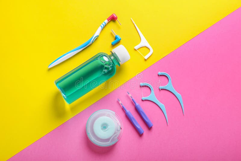 Flat Lay Composition with Dental Floss and Different Teeth Care