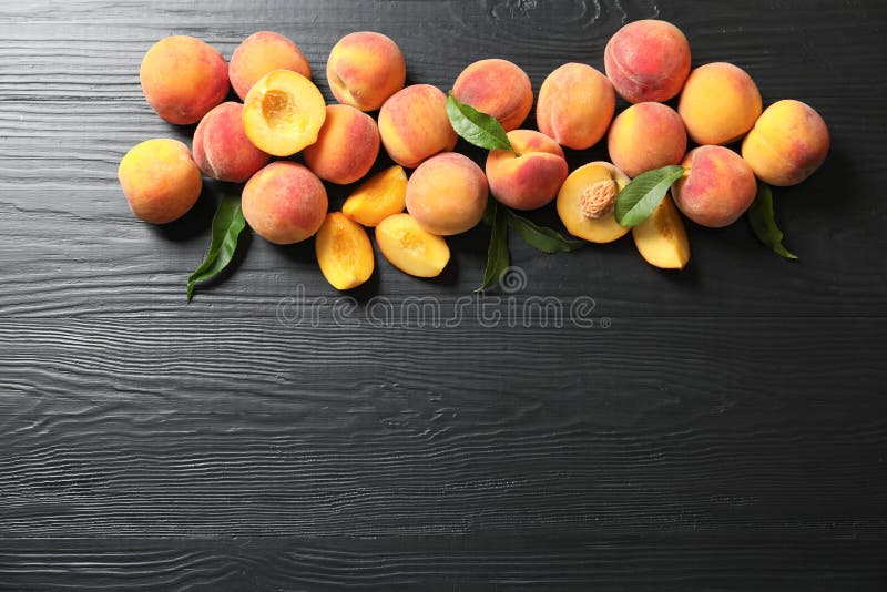 Flat lay composition with ripe peaches