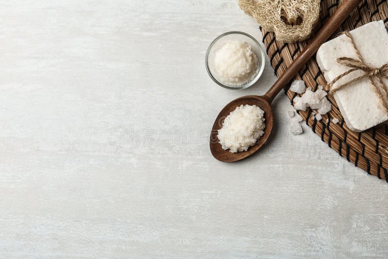 Flat lay composition with Shea butter and handmade soap on light background stock image