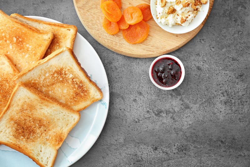 Flat Lay Composition with Toasted Bread, Jam and Cream Cheese on Grey Background Stock Image