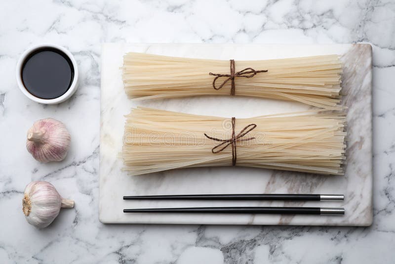 Flat Lay Composition with Uncooked Rice Noodles, Soy Sauce and