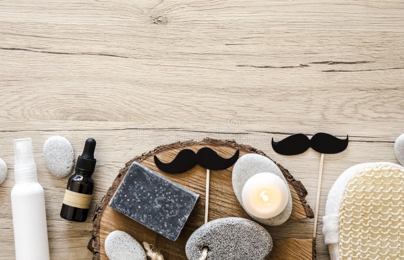 Flat lay composition of various man bathroom products with a lot of copy space.