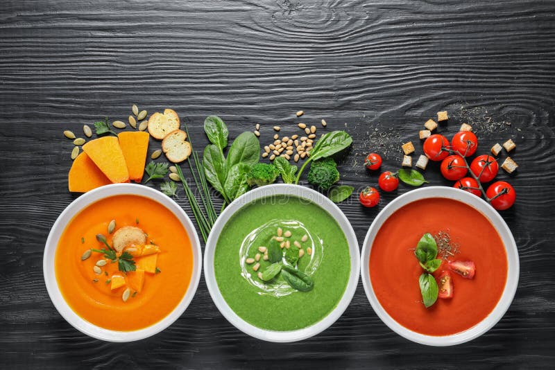 Flat lay composition with various soups and ingredients stock photography