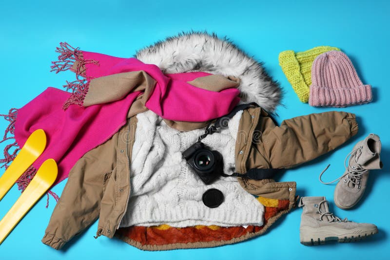 Flat Lay Composition with Warm Clothes for Winter Vacation on