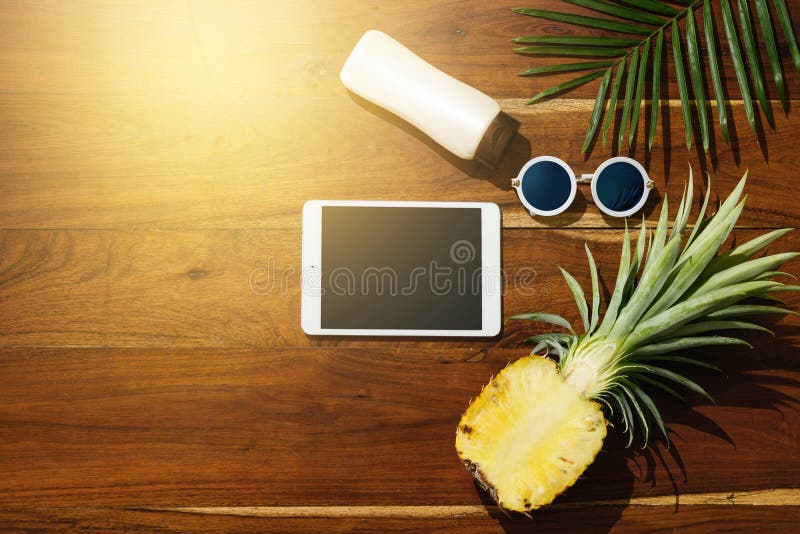 Flat lay of different items for beach vacations stock photo