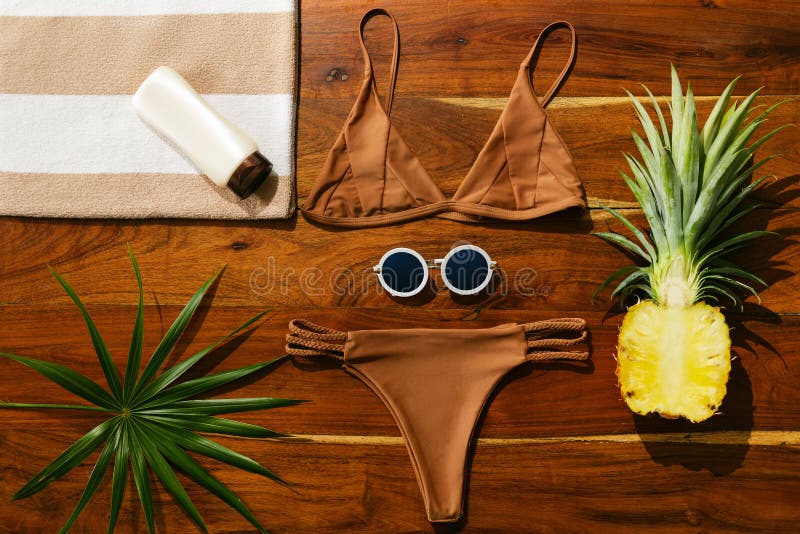 Flat lay of different items for beach vacations stock photos