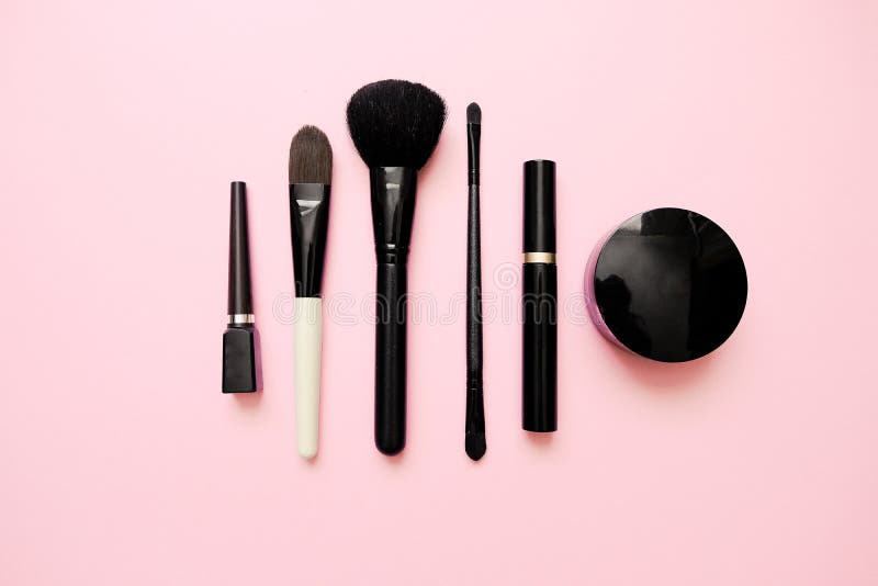 Flat lay of female fashion makeup products on pastel color background. Beauty and fashion concept. royalty free stock images Flat lay of female fashion makeup products on pastel color background. Beauty and fashion concept. royalty free stock images