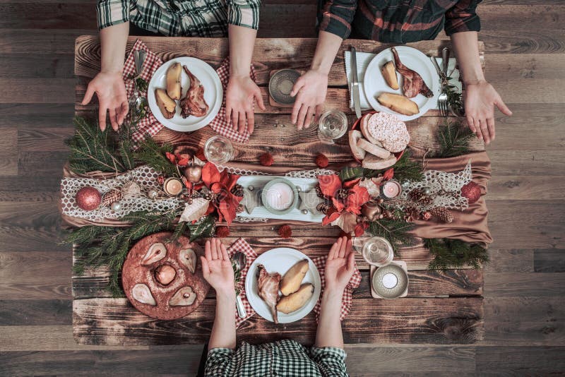 Flat-lay of friends hands eating and drinking together. Top view of people having party, gathering, celebrating together at wooden royalty free stock photos Flat-lay of friends hands eating and drinking together. Top view of people having party, gathering, celebrating together at wooden royalty free stock photos
