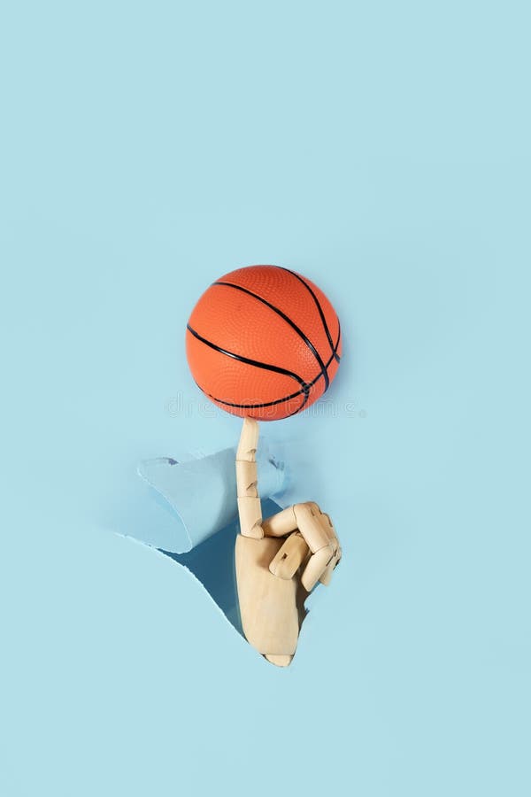 Flat Lay of Hand Holding Small Basketball Ball Minimal Creative Concept.  Stock Photo - Image of hole, color: 163833424
